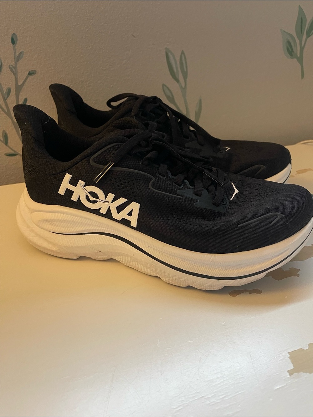 Hoka Black and White Cushion Running Sneakers